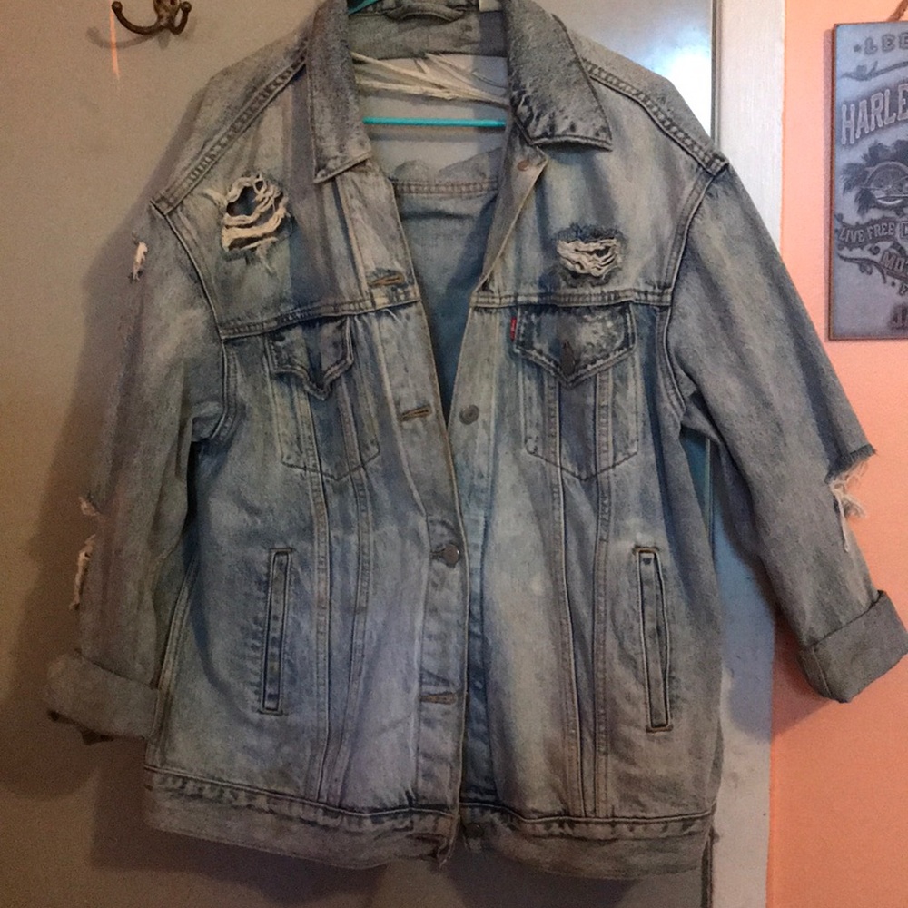 Distressed denim jacket